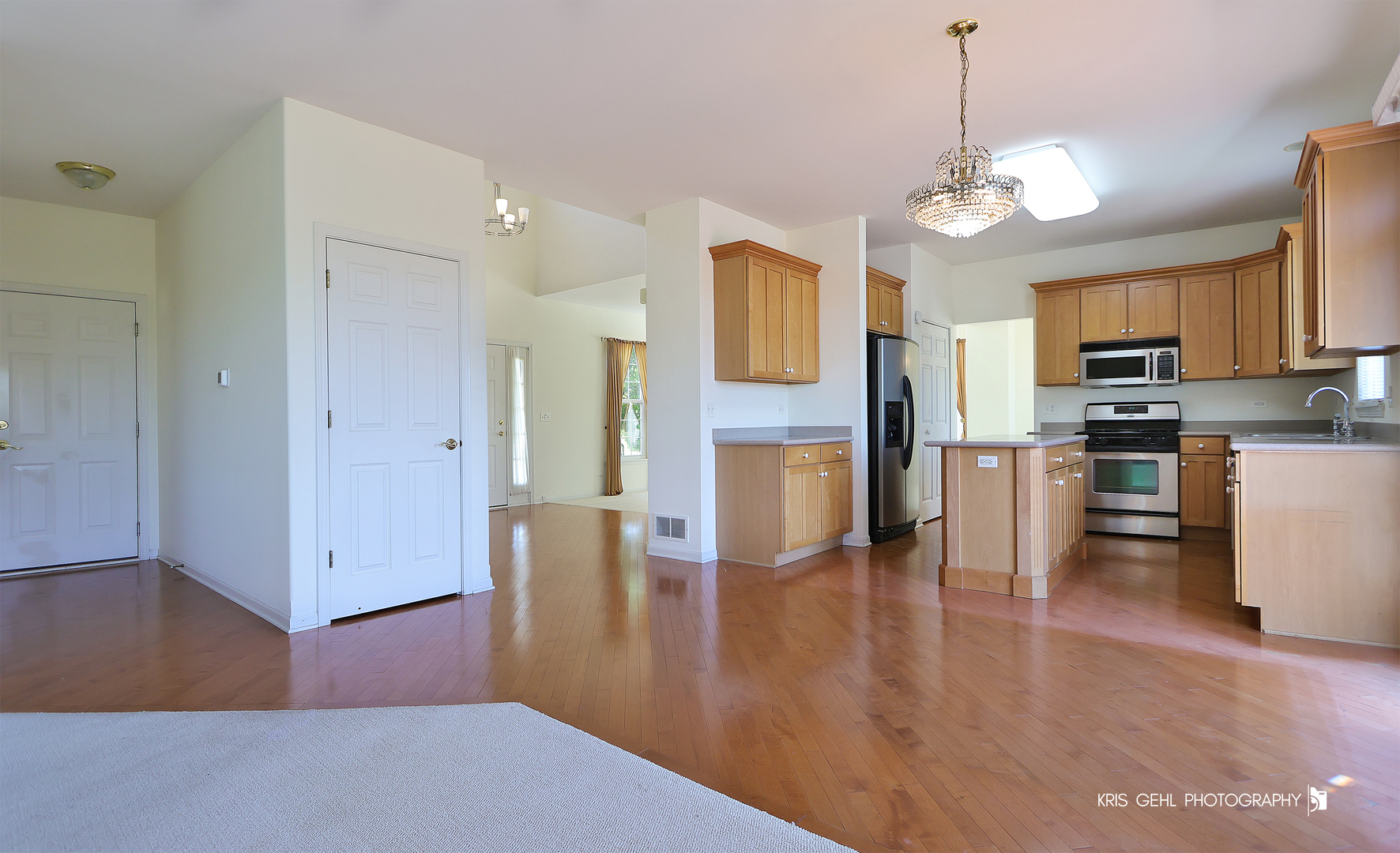 25619 West Bluestem Road Round Lake, IL 60073 - Photo 9 of 33 a view of kitchen with sink microwave and refrigerator