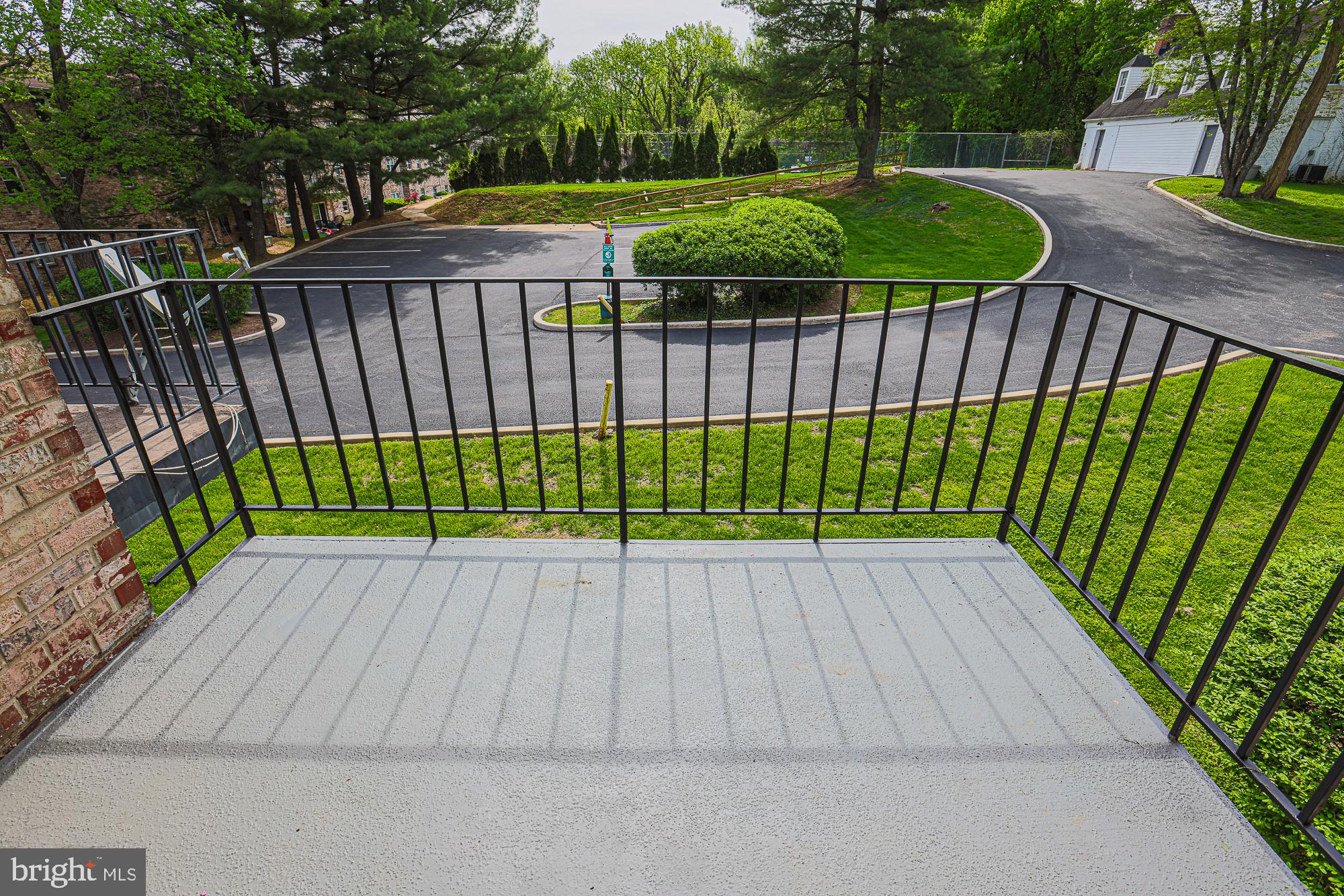 11908 Tarragon Road, Unit G Reisterstown, MD 21136 - Photo 20 of 22 Serene balcony with lush views.