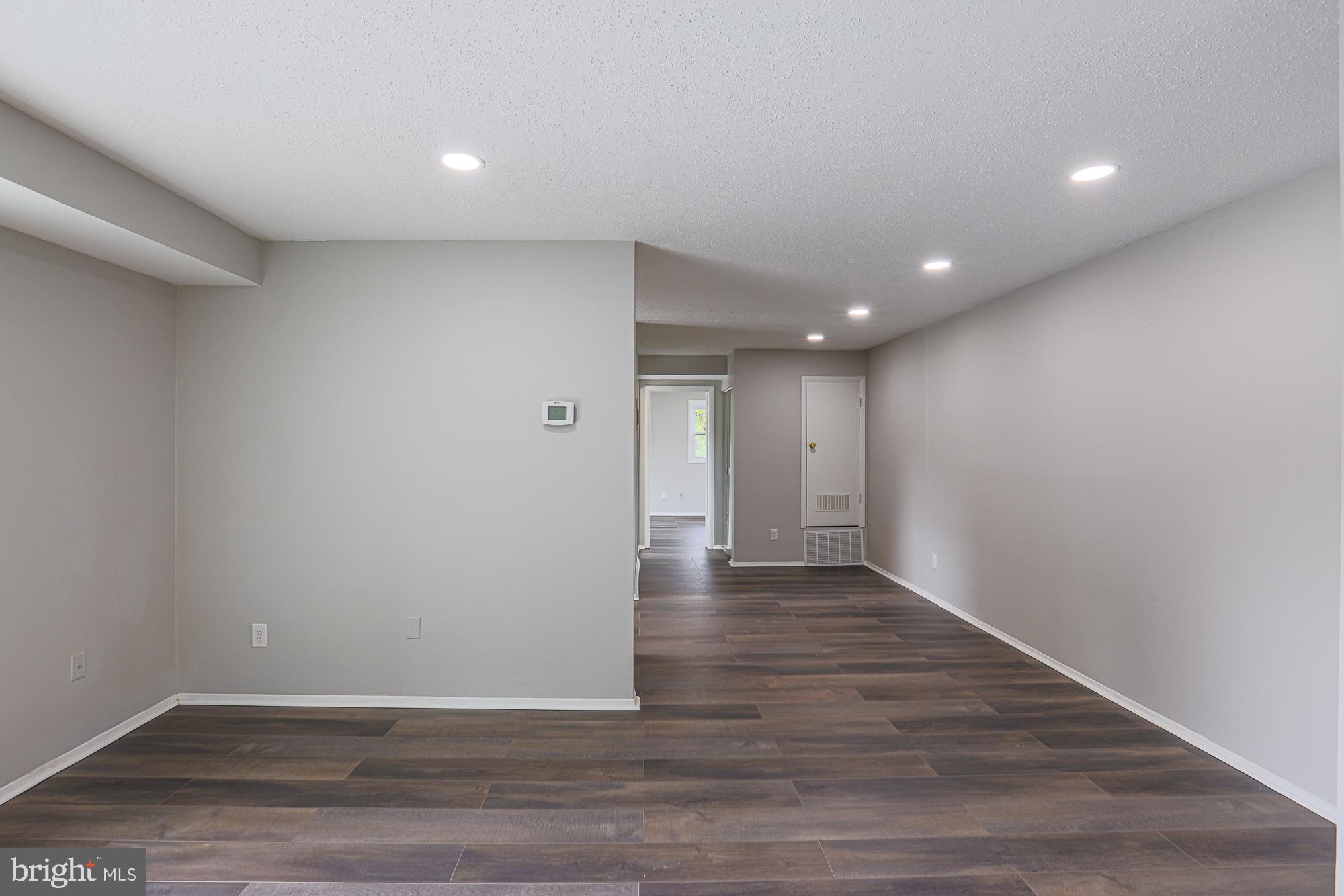 11908 Tarragon Road, Unit G Reisterstown, MD 21136 - Photo 5 of 22 Spacious, modern living area awaits you.