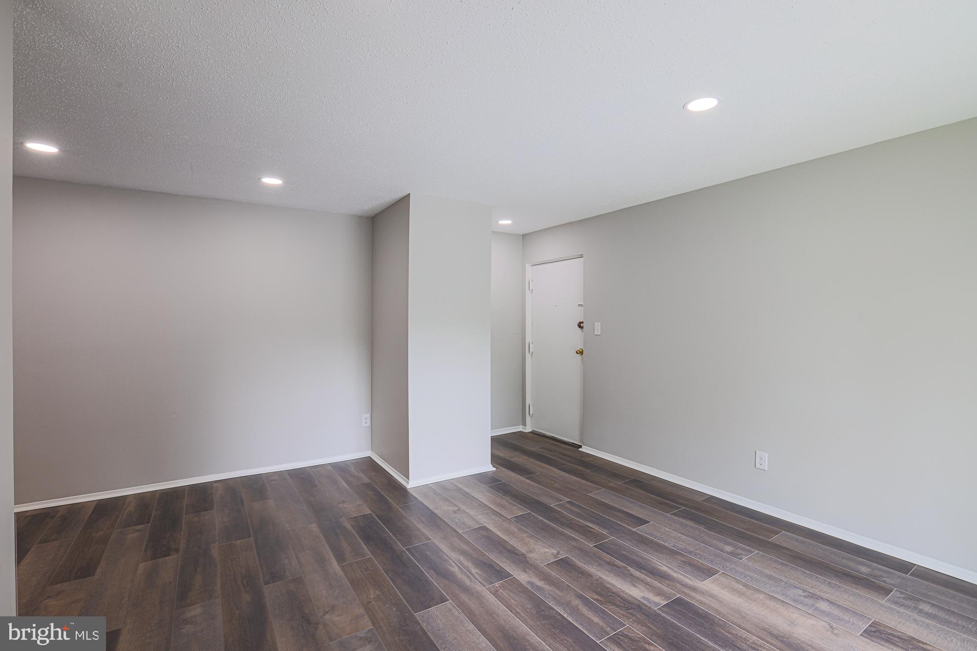 11908 Tarragon Road, Unit G Reisterstown, MD 21136 - Photo 7 of 22 Spacious, modern living area awaits.