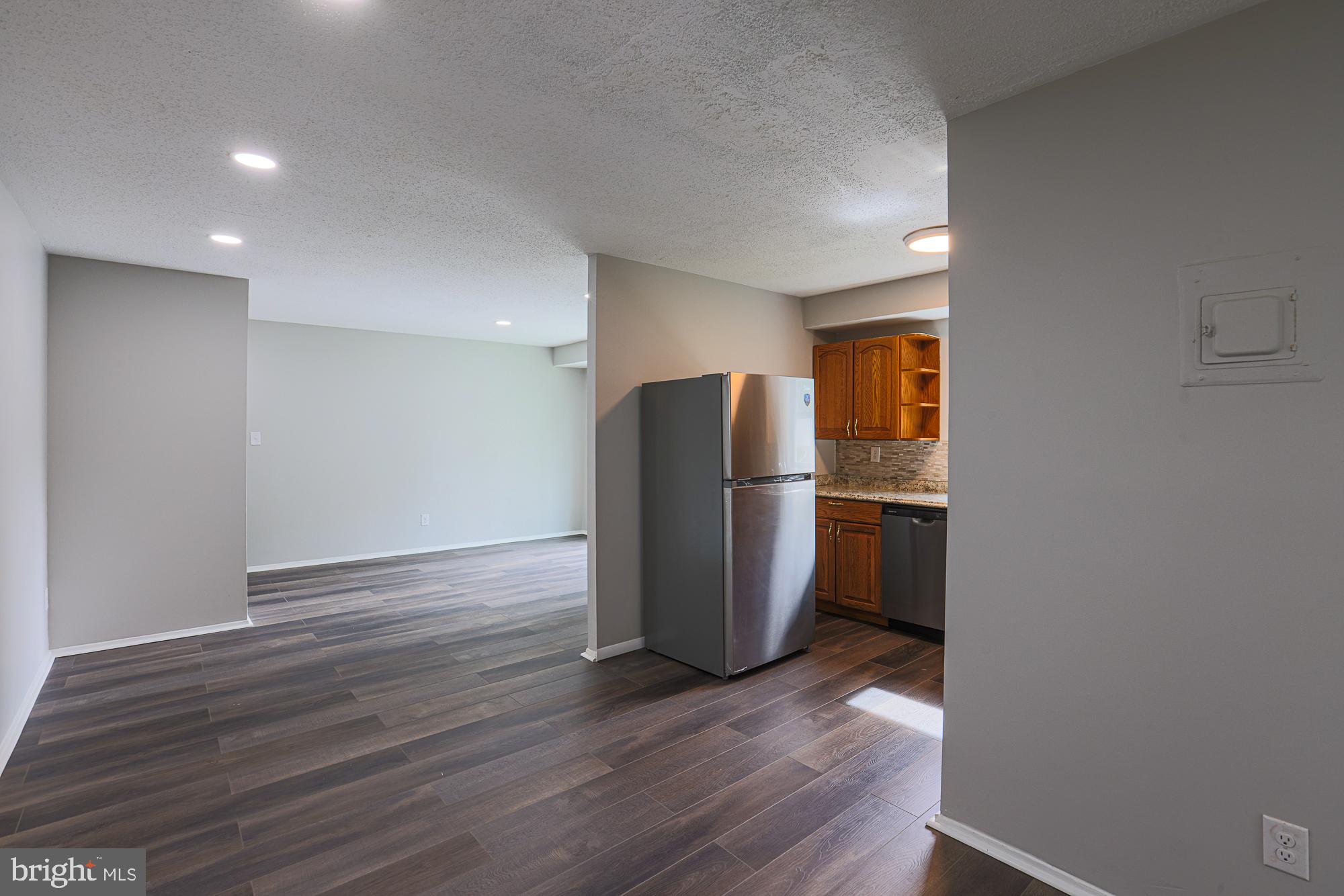 11908 Tarragon Road, Unit G Reisterstown, MD 21136 - Photo 10 of 22 Spacious modern living area awaits you.