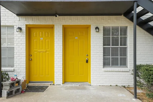 a front view of a house with a garage
