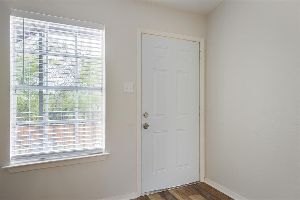 1105 UTA Boulevard, Unit 102 Arlington, TX 76013 - Photo 10 of 10 a view of a small space with a window