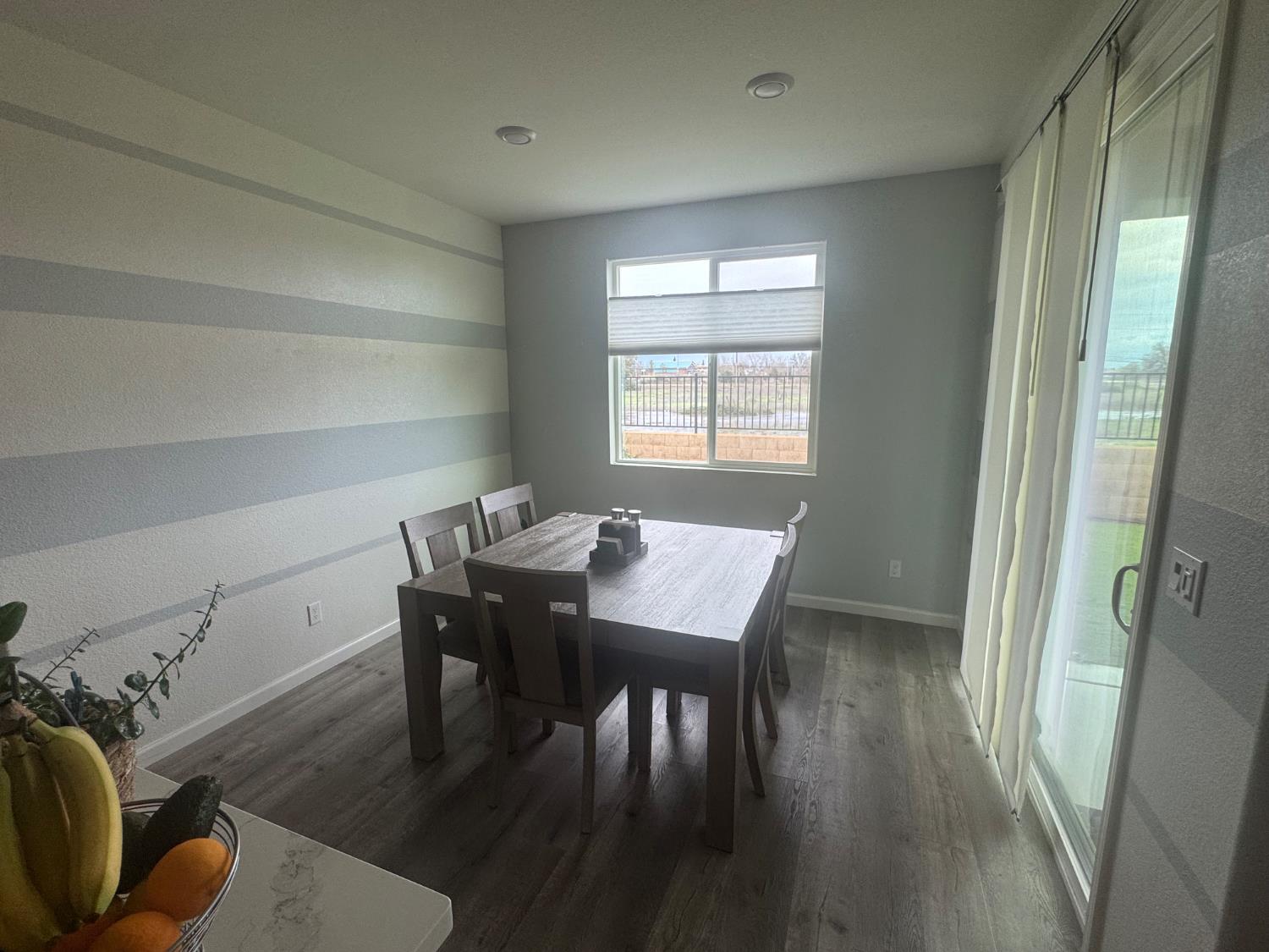 9475 Pasaje Place Elk Grove, CA 95624 - Photo 21 of 26 a view of a workspace with furniture and wooden floor