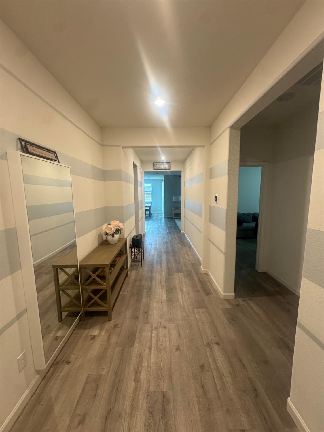 9475 Pasaje Place Elk Grove, CA 95624 - Photo 3 of 26 a furnished livingroom with a chair