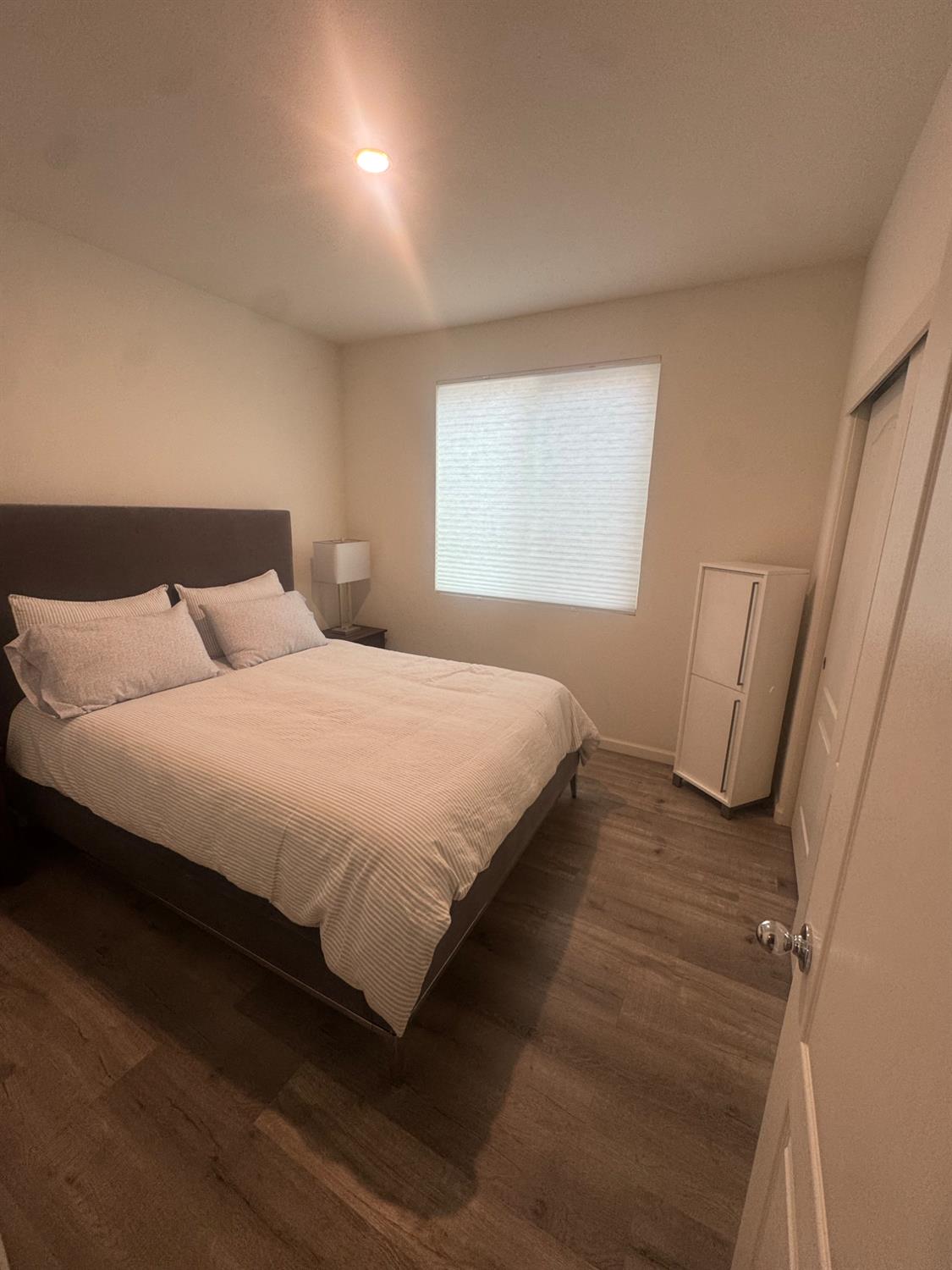 9475 Pasaje Place Elk Grove, CA 95624 - Photo 6 of 26 a bedroom with bed and window