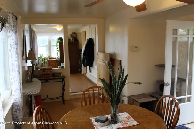 a view of entryway and livingroom with furniture