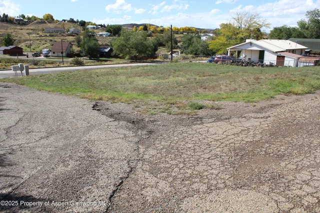 a view of a town with barn