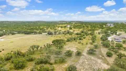 a view of lawn chairs and island