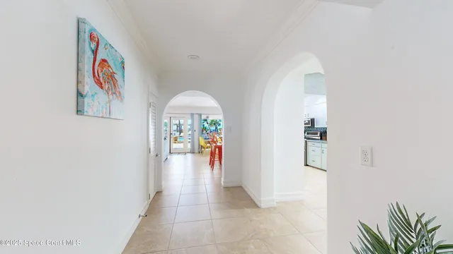 a bedroom with a bed and flat screen tv