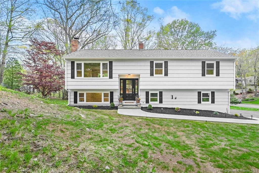 66 Autumn Ridge Road Shelton, CT 06484 - Photo 1 of 1 front view of a house with a yard