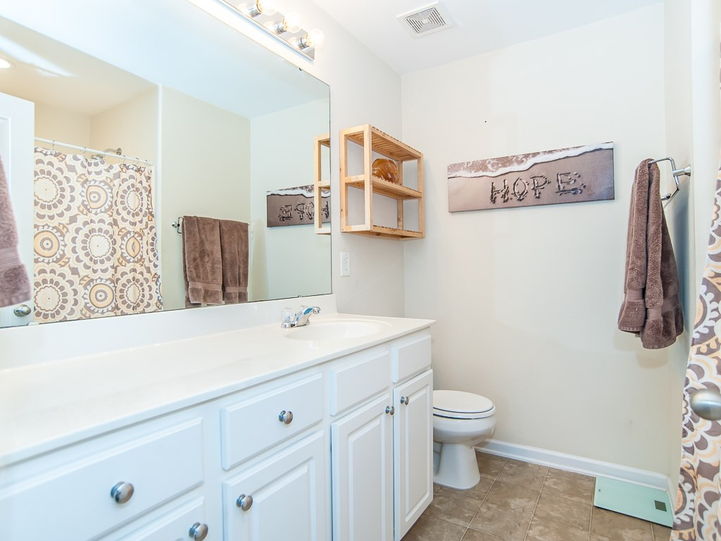 4815 Sir Duncan Way Raleigh, NC 27612 - Photo 20 of 25 Master Bathroom includes a generous sized vanity. Master Bathroom