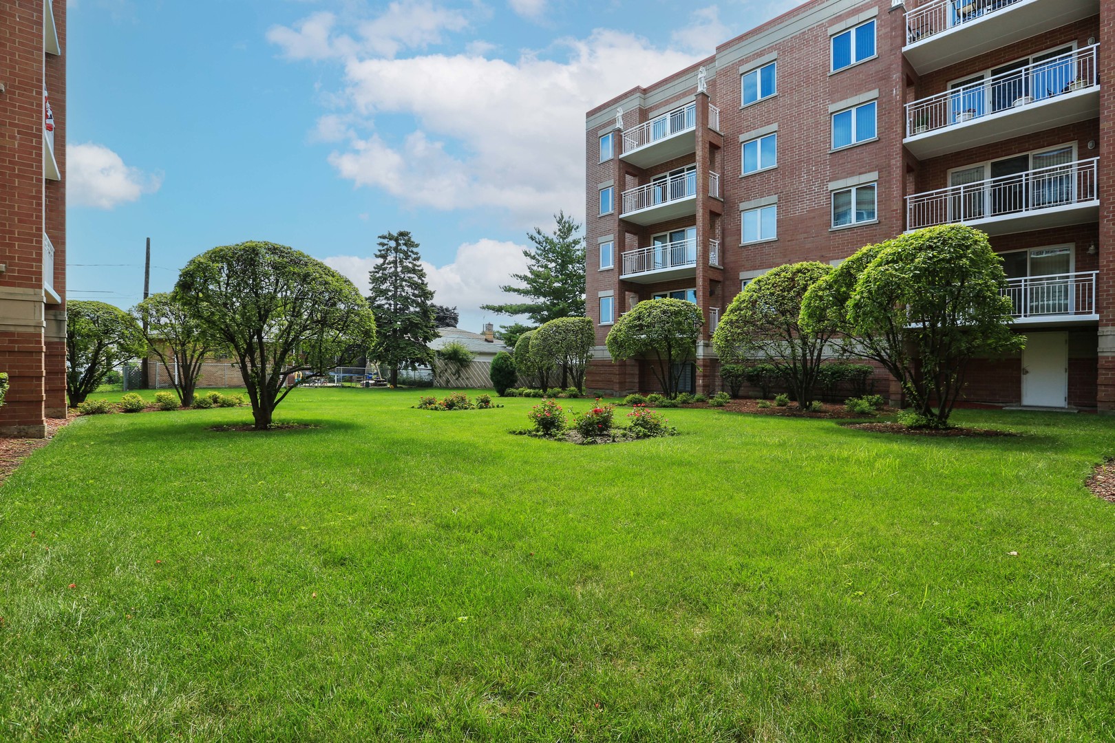 4655 North Cumberland Avenue, Unit 502 Norridge, IL 60706 - Photo 11 of 11 a view of a building with a yard