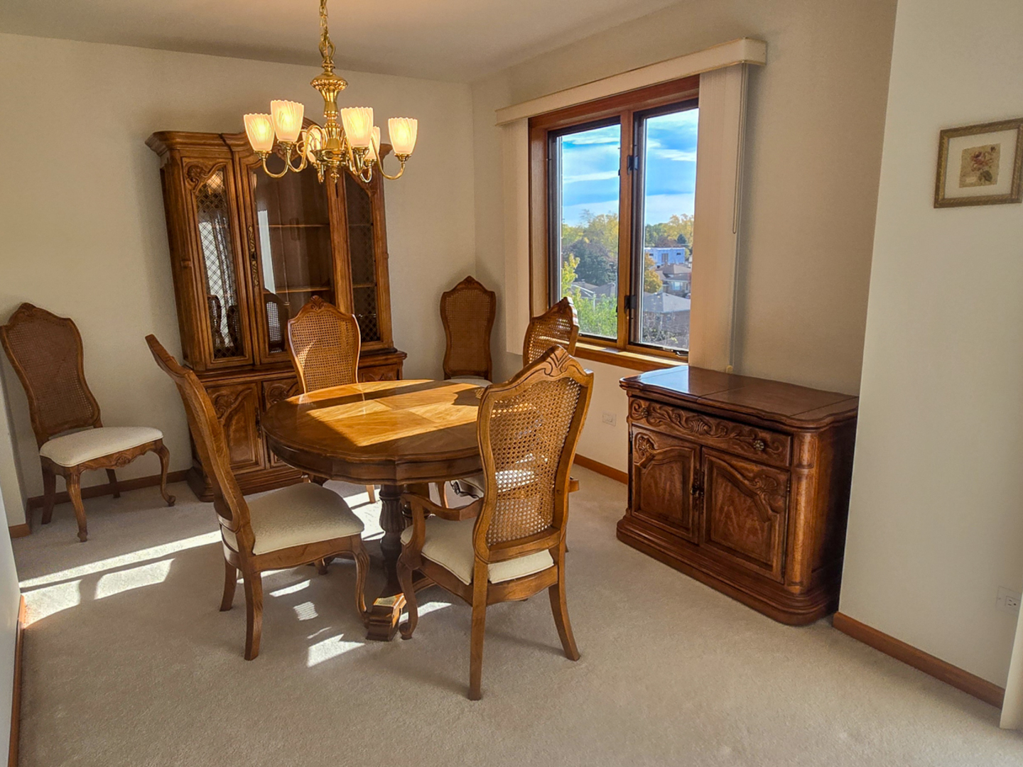 4655 North Cumberland Avenue, Unit 502 Norridge, IL 60706 - Photo 4 of 11 a view of a dining room with furniture and chandelier