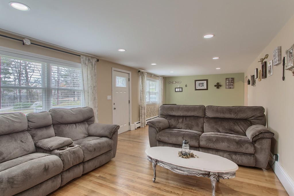 547 Boston Road Billerica, MA 01821 - Photo 8 of 23 a living room with furniture and a large window