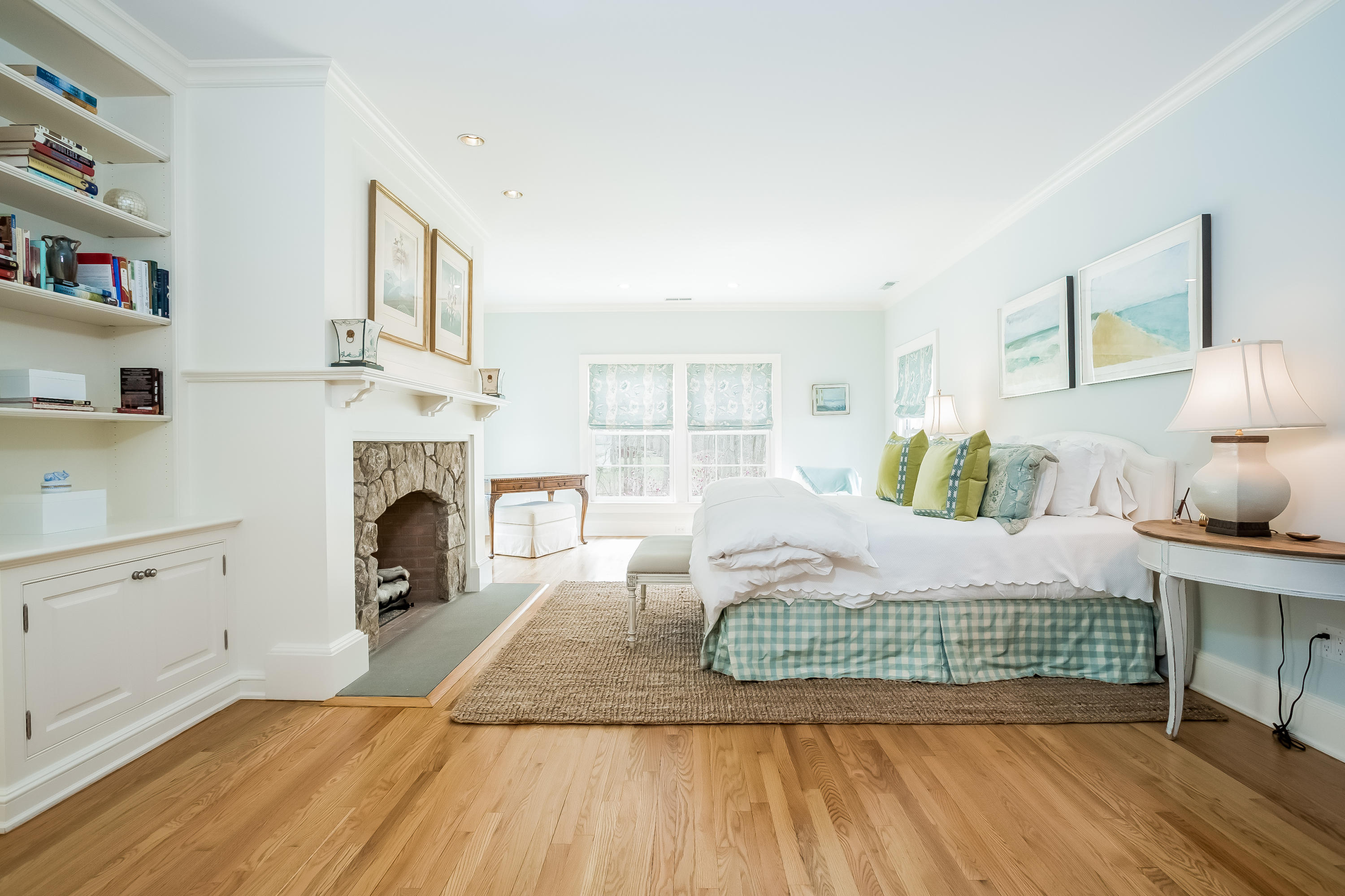 8 Haskell Lane Darien, CT 06820 - Photo 18 of 31 a bedroom with a bed and a fireplace