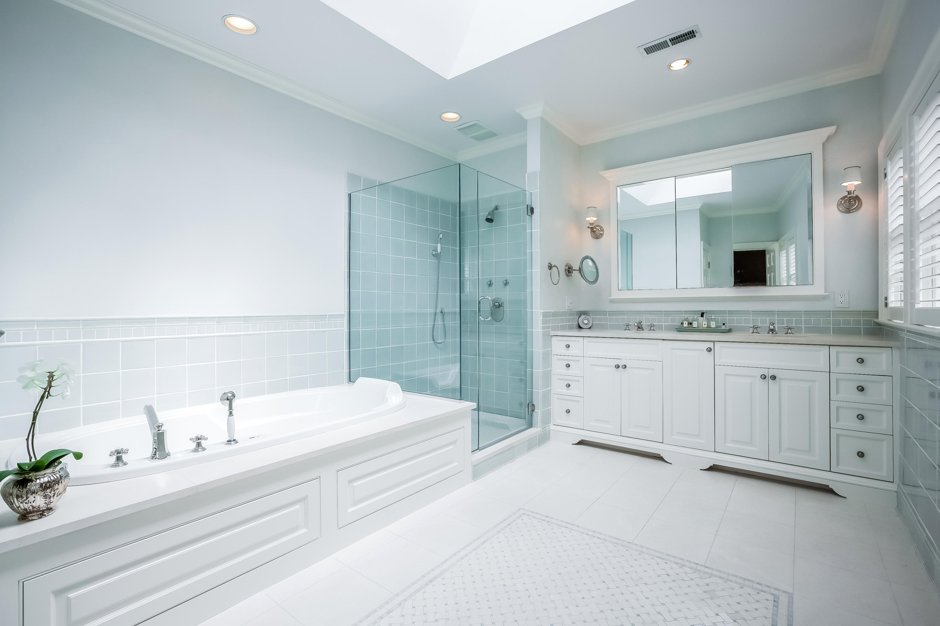 8 Haskell Lane Darien, CT 06820 - Photo 19 of 31 a spacious bathroom with a granite countertop sink mirror and shower
