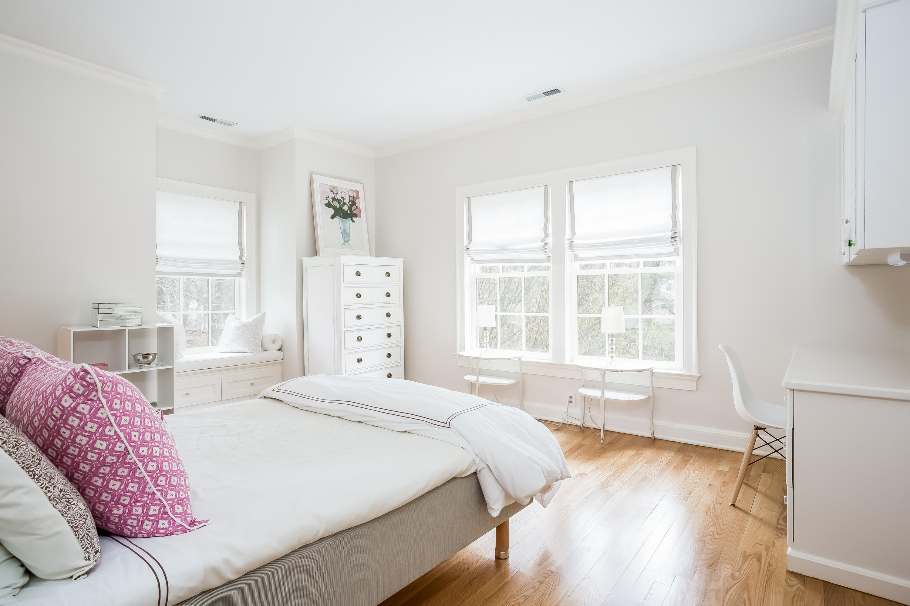 8 Haskell Lane Darien, CT 06820 - Photo 20 of 31 a spacious bedroom with a bed and a window