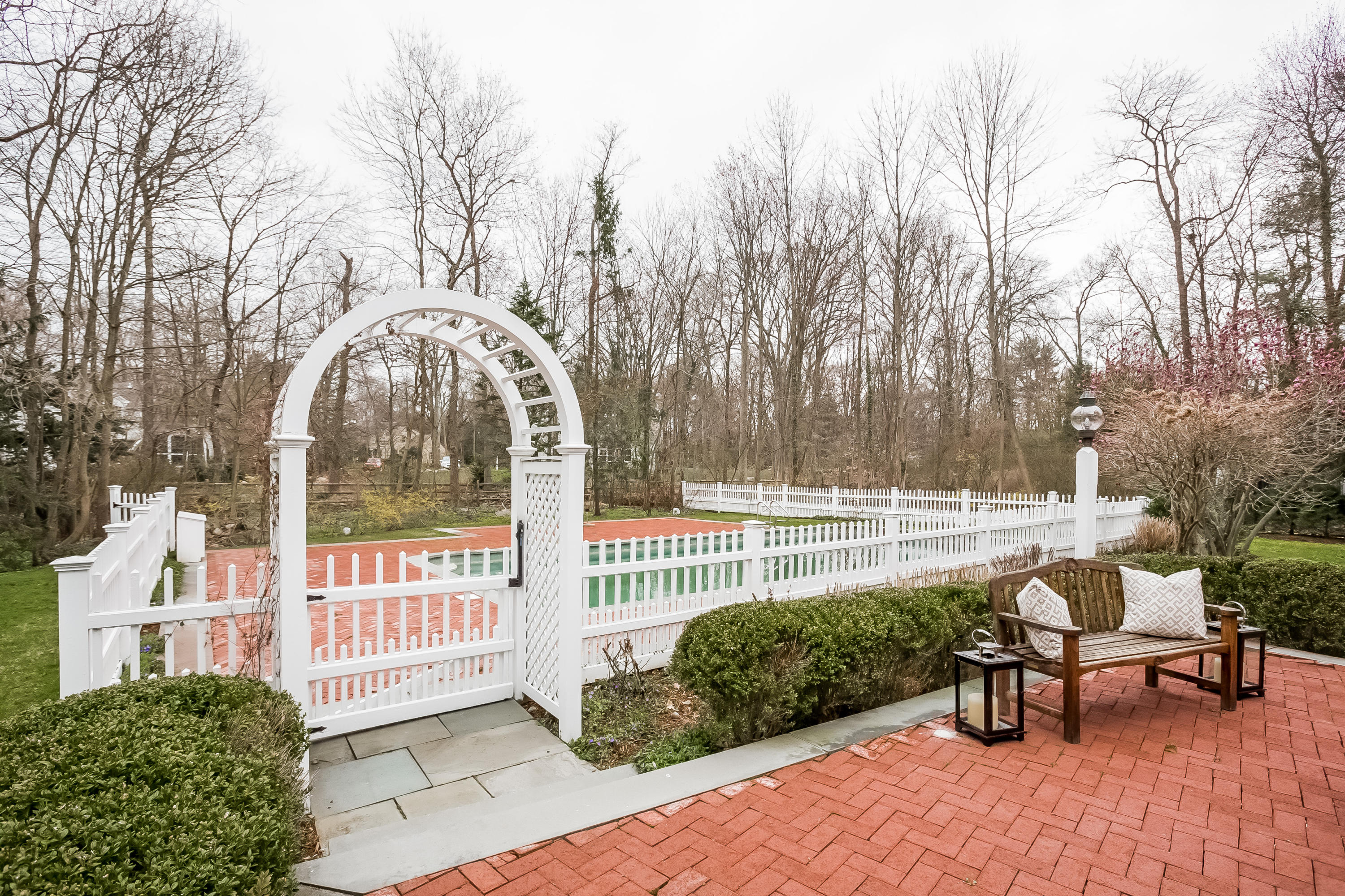 8 Haskell Lane Darien, CT 06820 - Photo 27 of 31 a view of a bench in a back yard