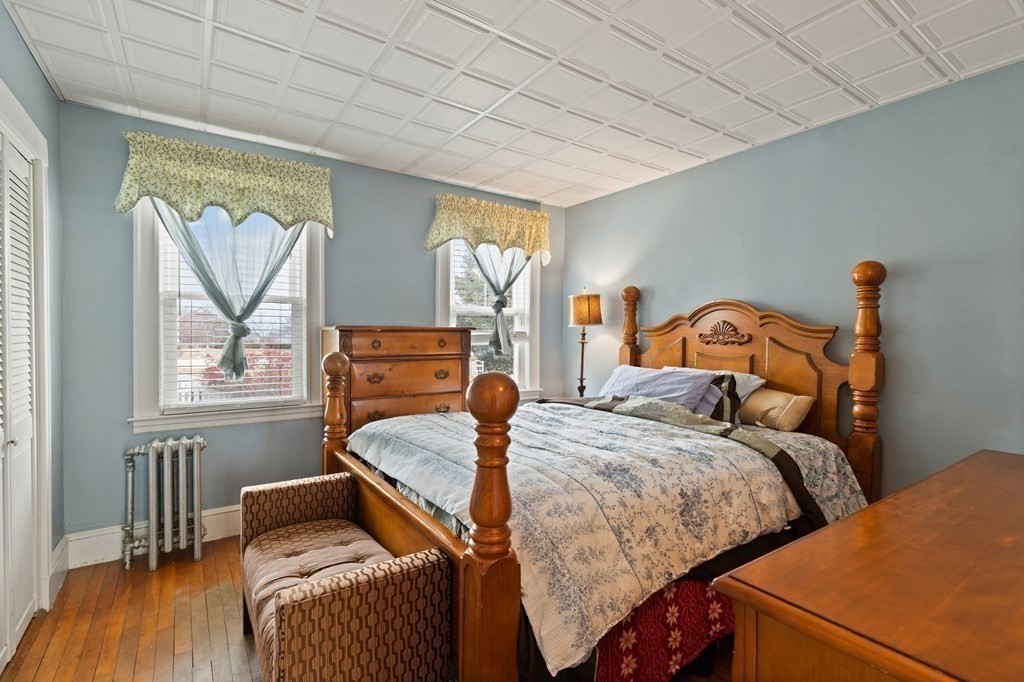 57 Chadwick Road Haverhill, MA 01835 - Photo 15 of 25 a bedroom with two beds and wooden floor