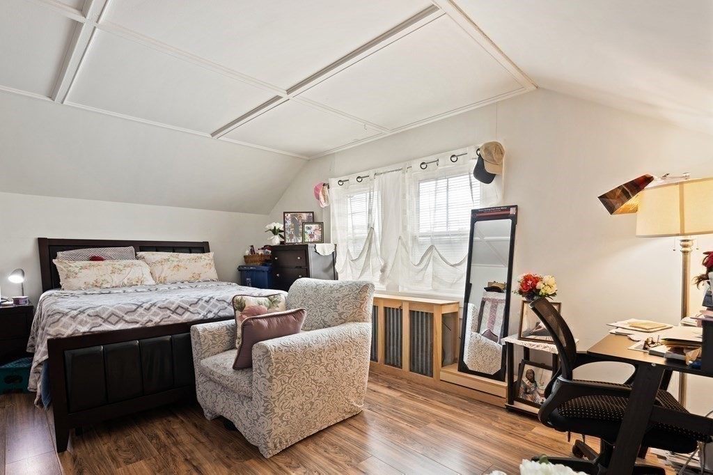 57 Chadwick Road Haverhill, MA 01835 - Photo 21 of 25 a bedroom with furniture and wooden floor