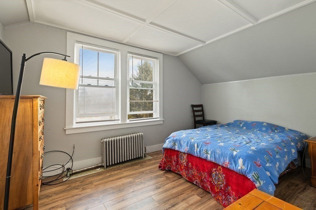57 Chadwick Road Haverhill, MA 01835 - Photo 22 of 25 a bedroom with a bed and a window
