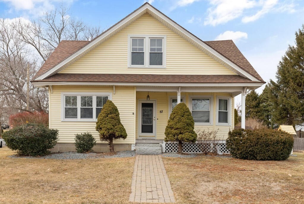 57 Chadwick Road Haverhill, MA 01835 - Photo 4 of 25 a front view of a house with a yard