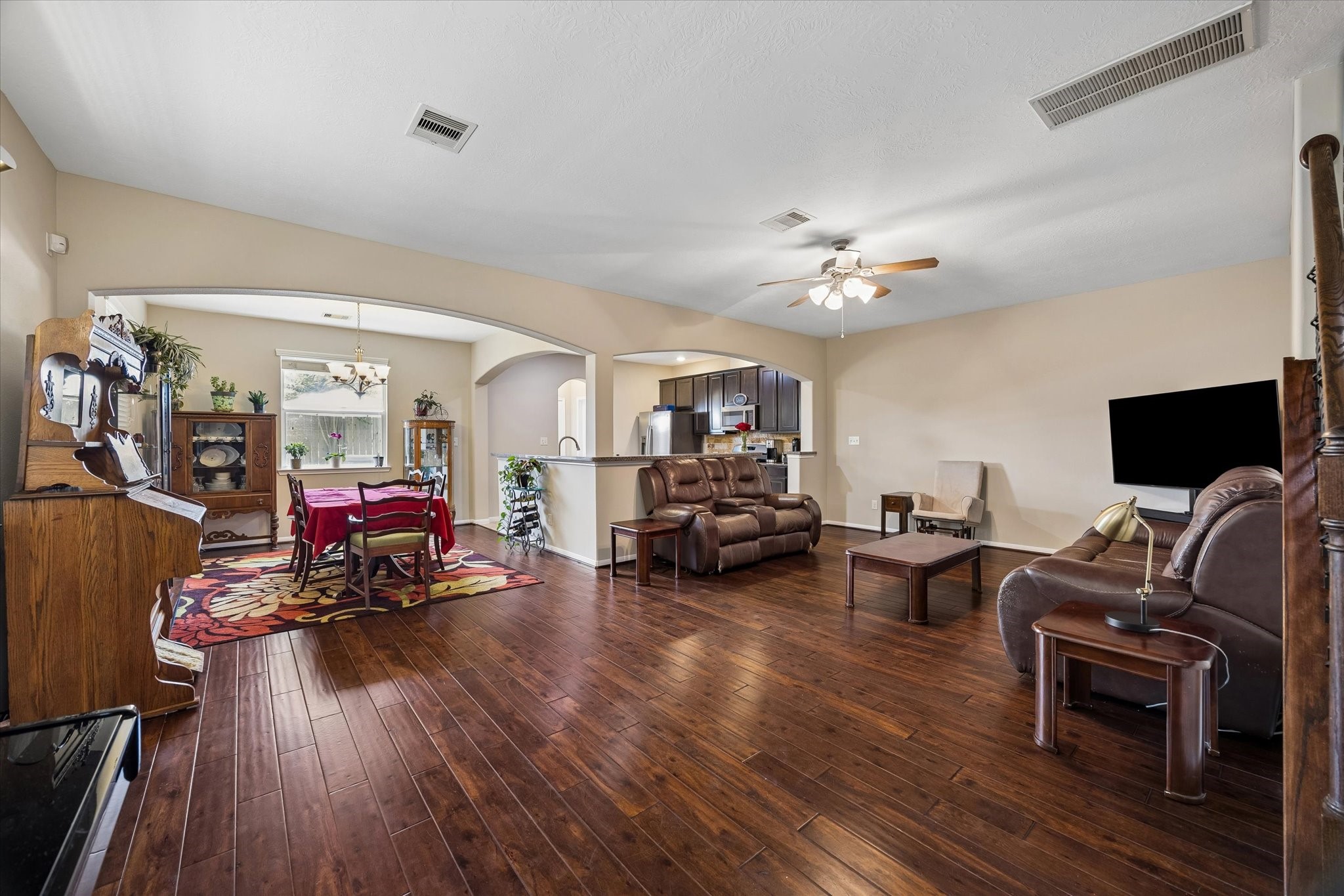 8433 Sunset Loch Drive Spring, TX 77379 - Photo 6 of 25 a living room with furniture and a flat screen tv