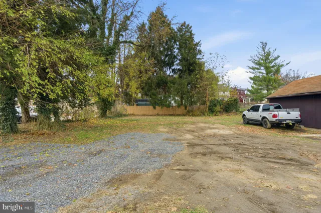 a house with trees in the background