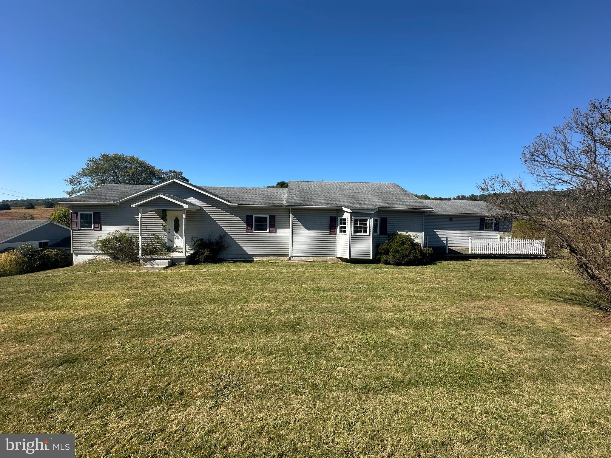 1-794 Harbaugh Valley Road Fairfield, PA 17320 - Photo 3 of 95 a front view of a house with a garden and yard