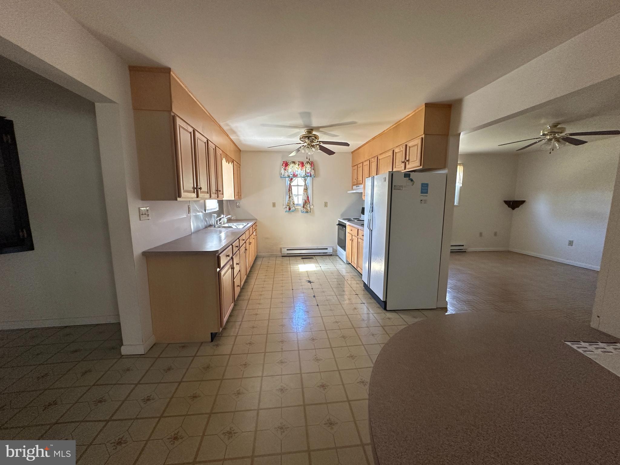 1-794 Harbaugh Valley Road Fairfield, PA 17320 - Photo 37 of 95 a kitchen with stainless steel appliances a refrigerator and a cabinets