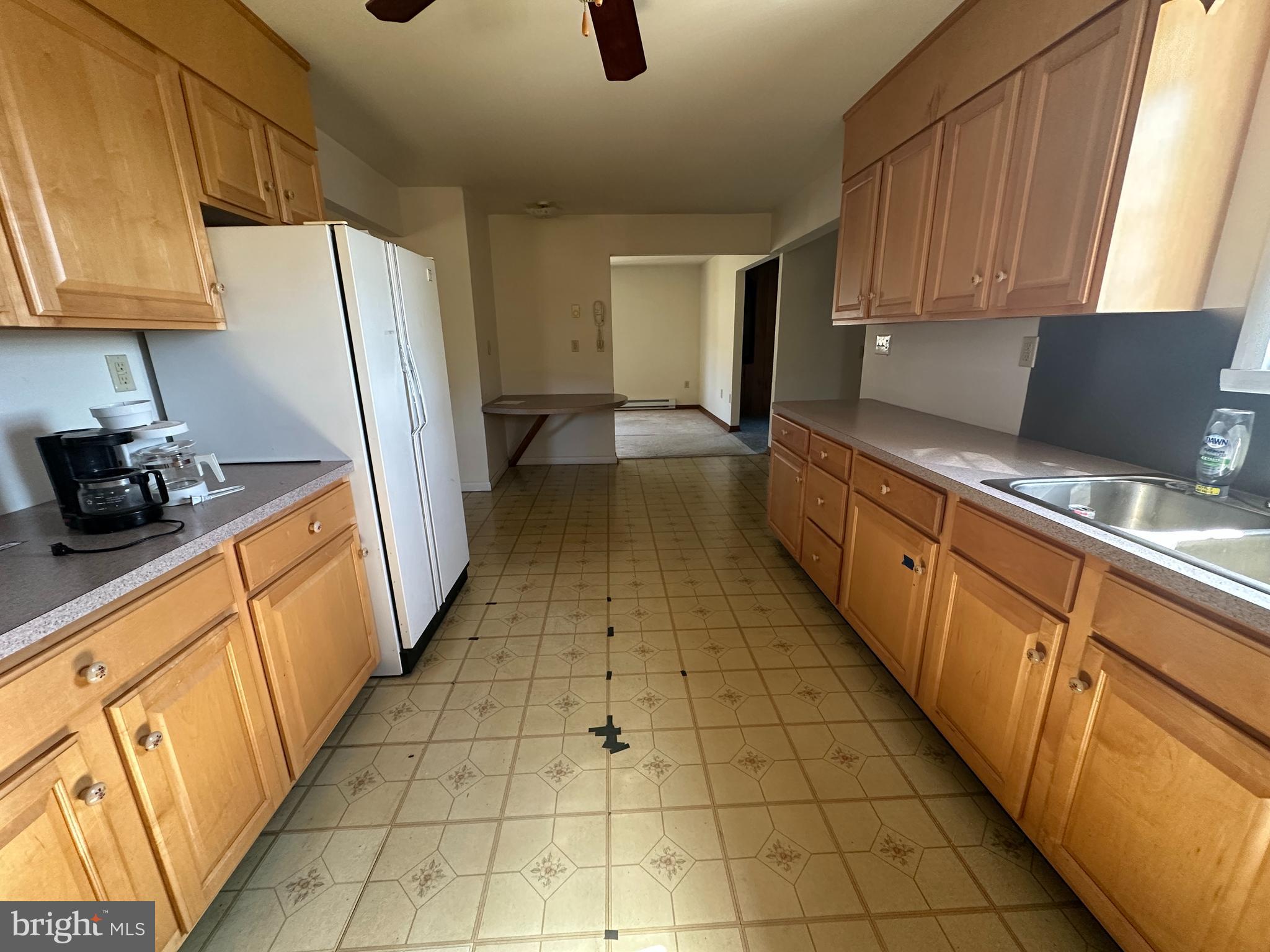1-794 Harbaugh Valley Road Fairfield, PA 17320 - Photo 38 of 95 a kitchen with stainless steel appliances a refrigerator sink and cabinets