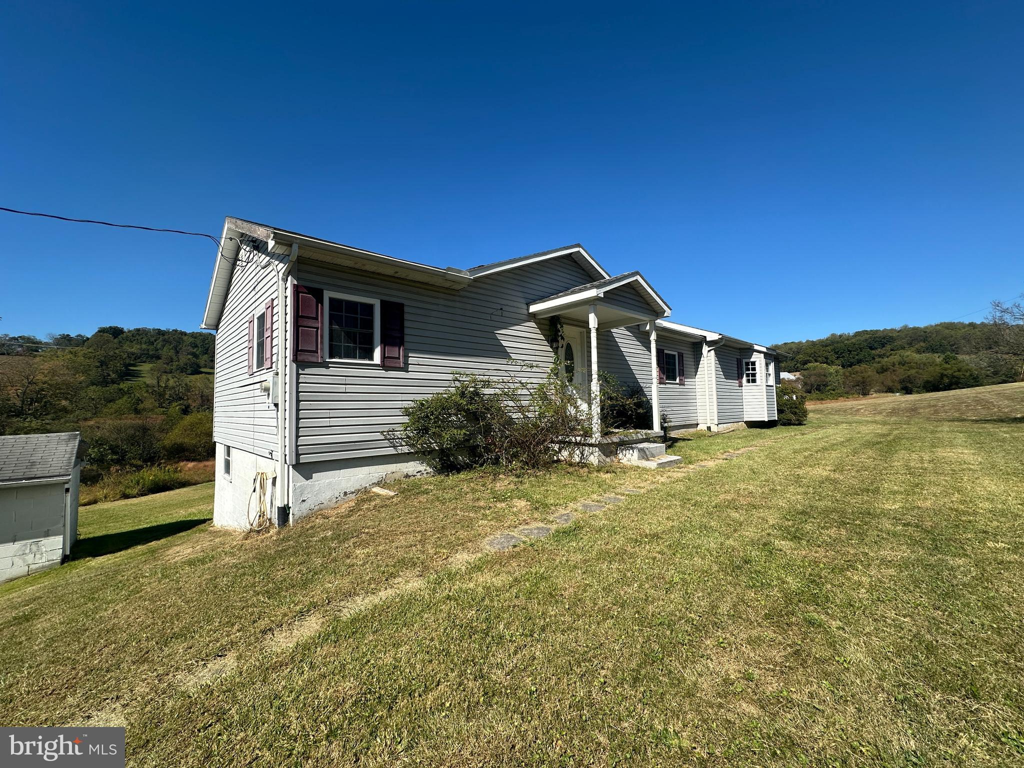 1-794 Harbaugh Valley Road Fairfield, PA 17320 - Photo 4 of 95 a front view of a house with a yard