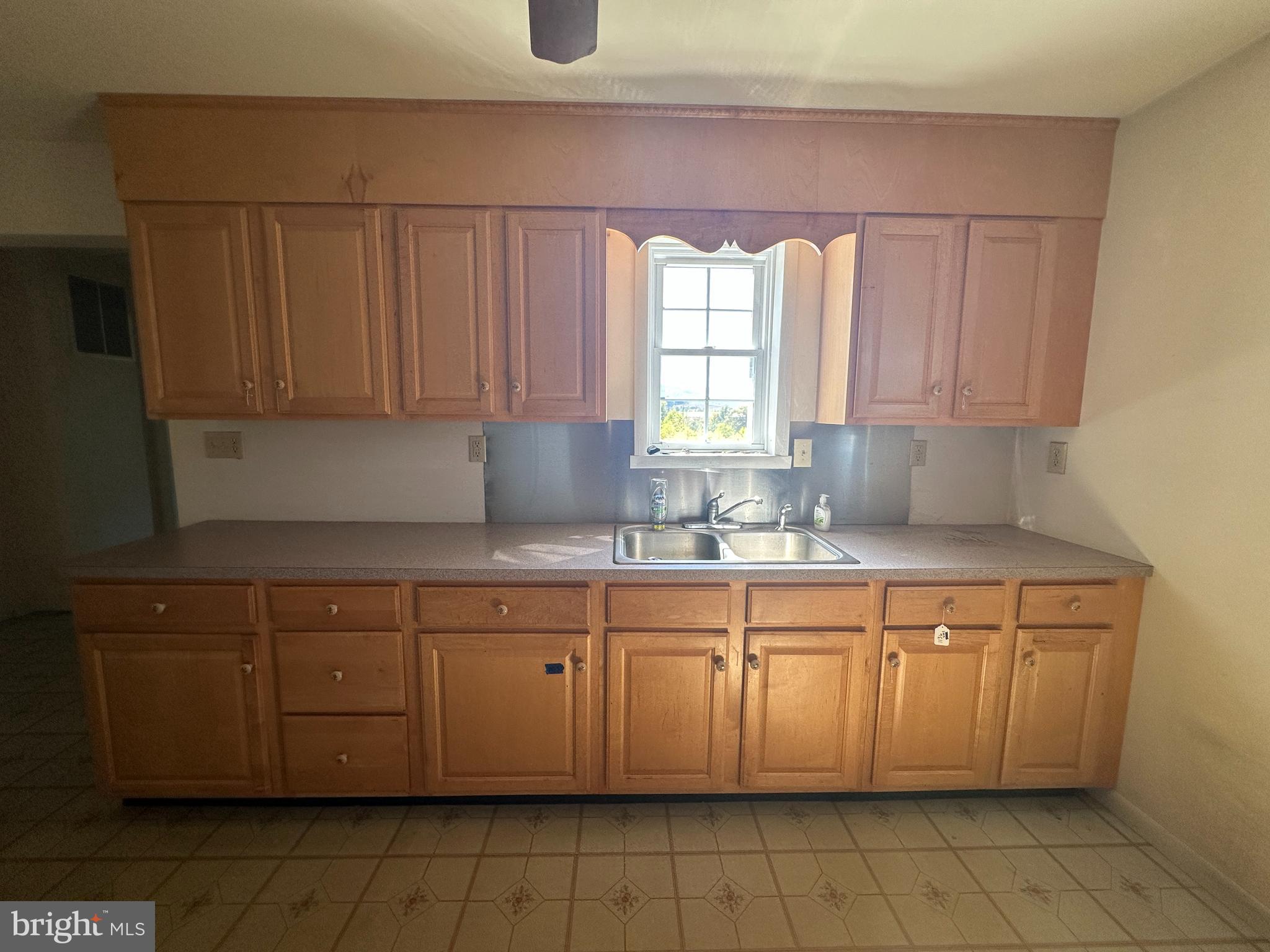 1-794 Harbaugh Valley Road Fairfield, PA 17320 - Photo 41 of 95 a kitchen with a sink and cabinets
