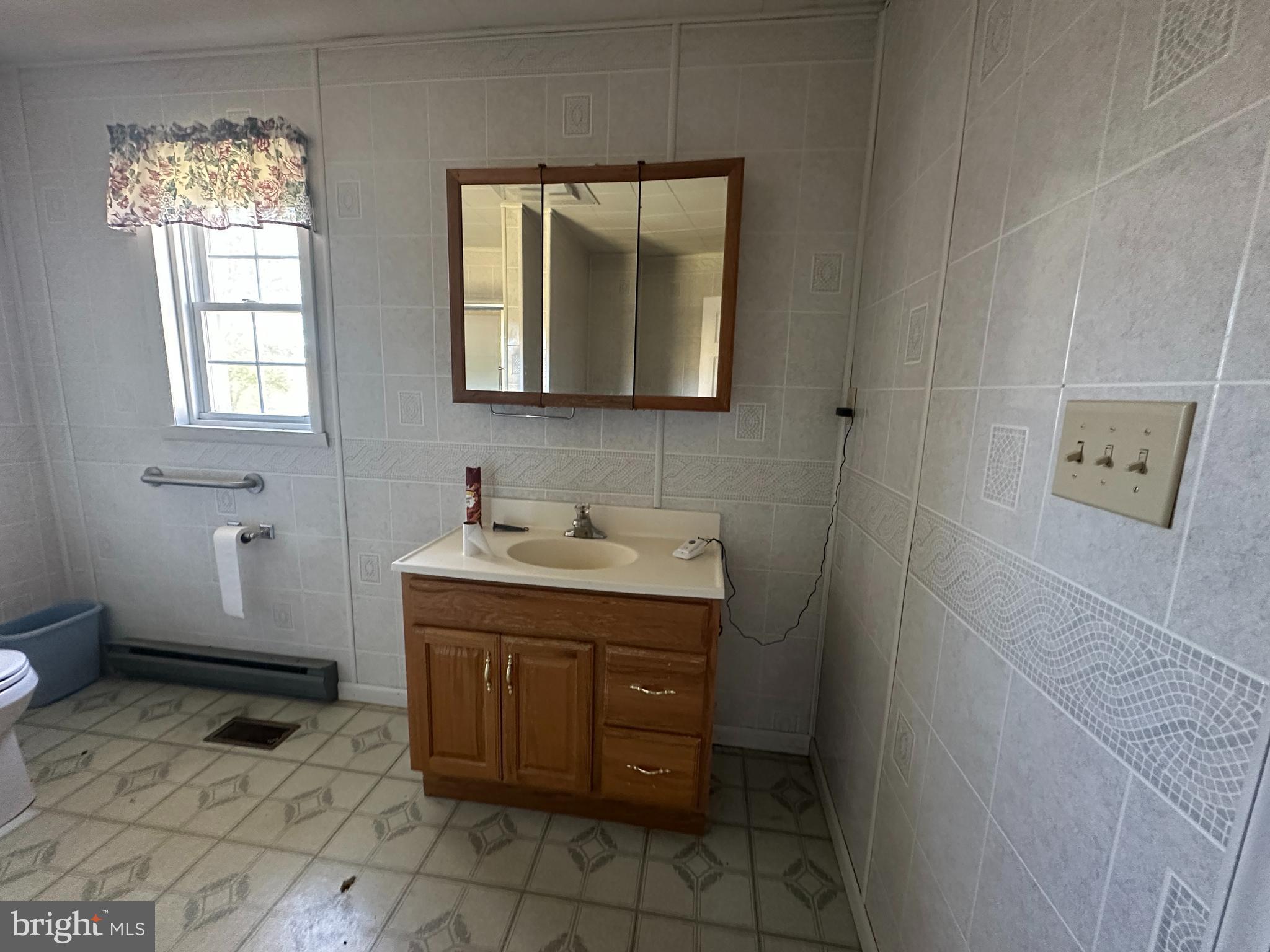 1-794 Harbaugh Valley Road Fairfield, PA 17320 - Photo 48 of 95 a bathroom with a sink and a mirror