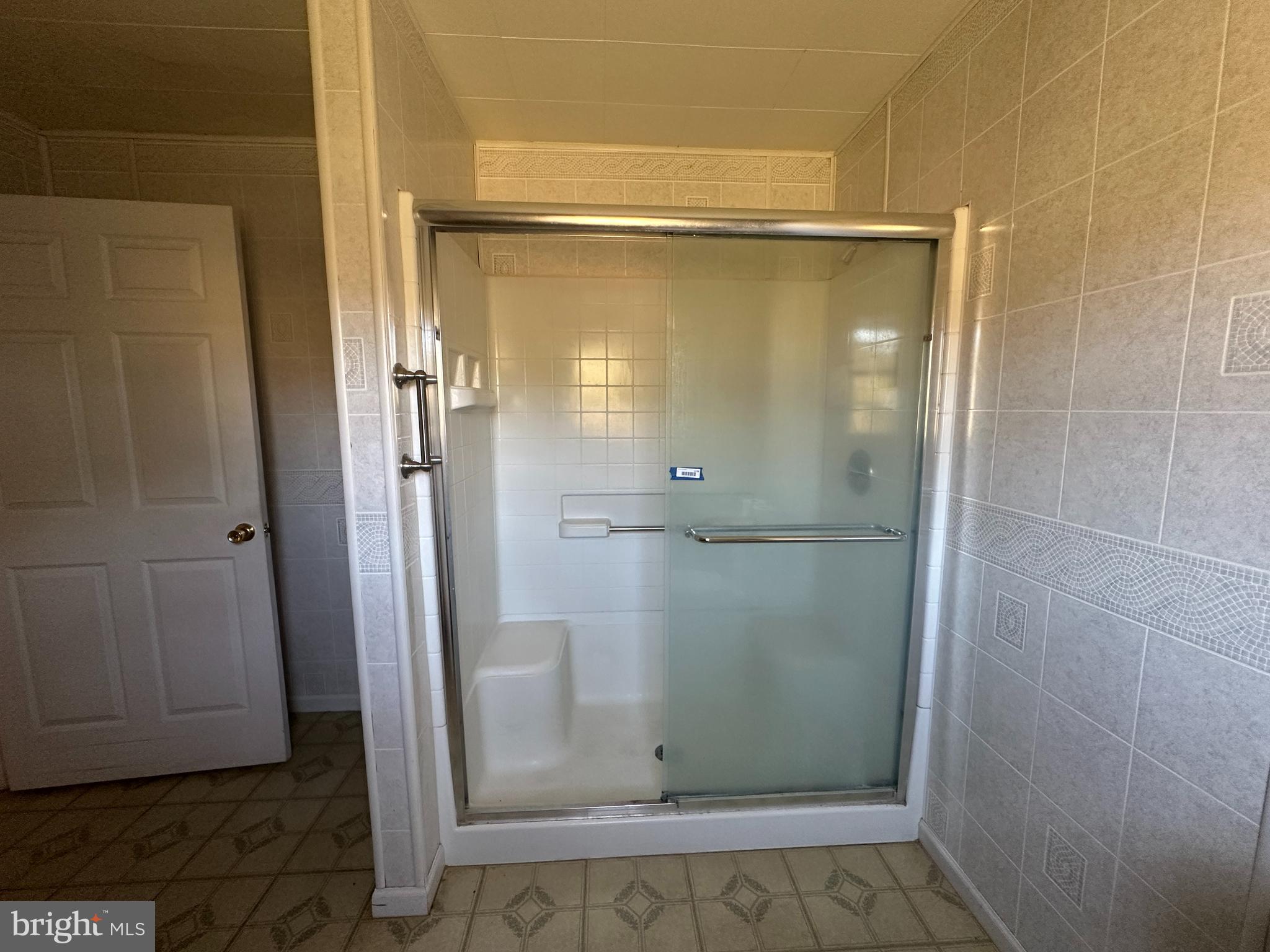 1-794 Harbaugh Valley Road Fairfield, PA 17320 - Photo 50 of 95 a bathroom with a glass shower door