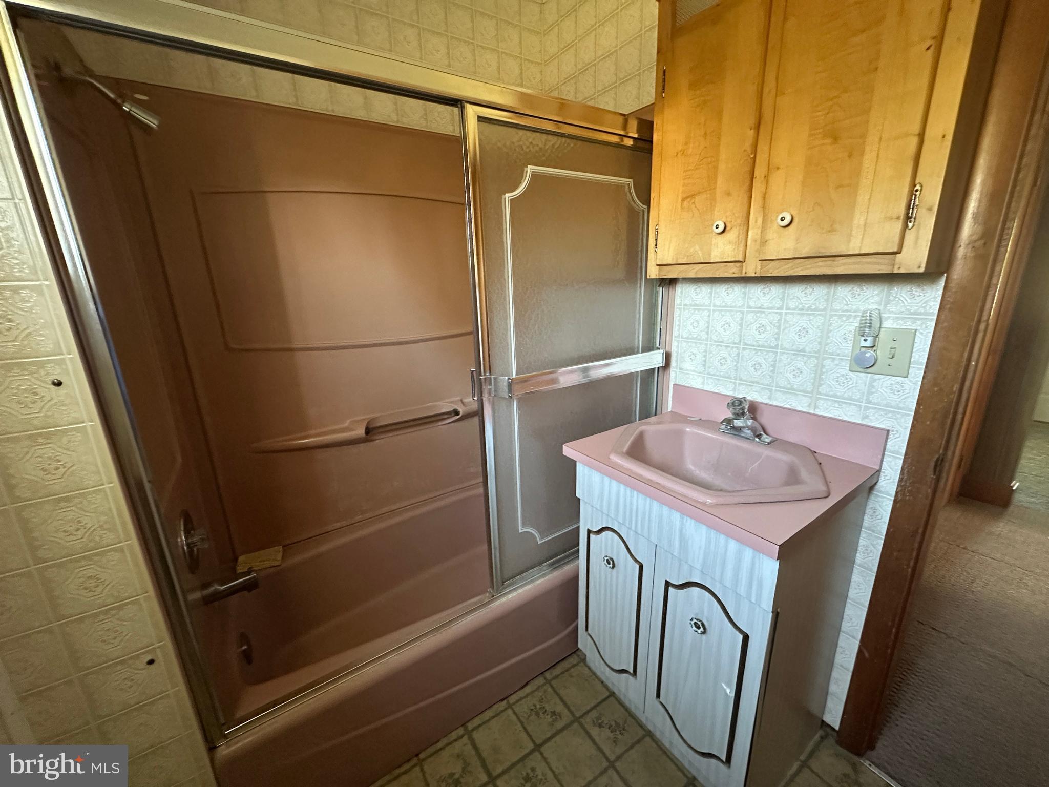 1-794 Harbaugh Valley Road Fairfield, PA 17320 - Photo 59 of 95 a bathroom with a sink a washer and dryer