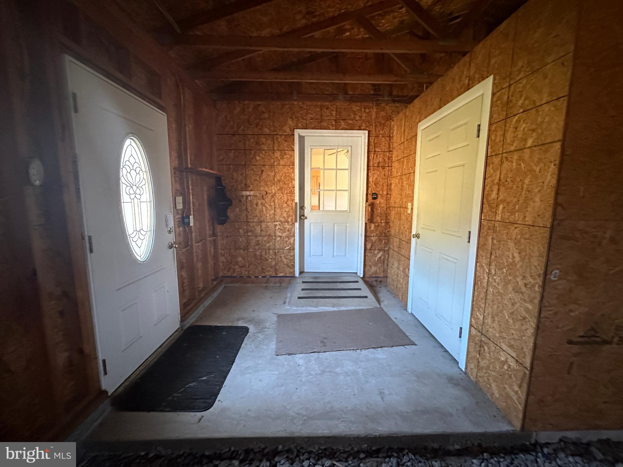 1-794 Harbaugh Valley Road Fairfield, PA 17320 - Photo 72 of 95 a view of a hallway with wooden floor and a living room