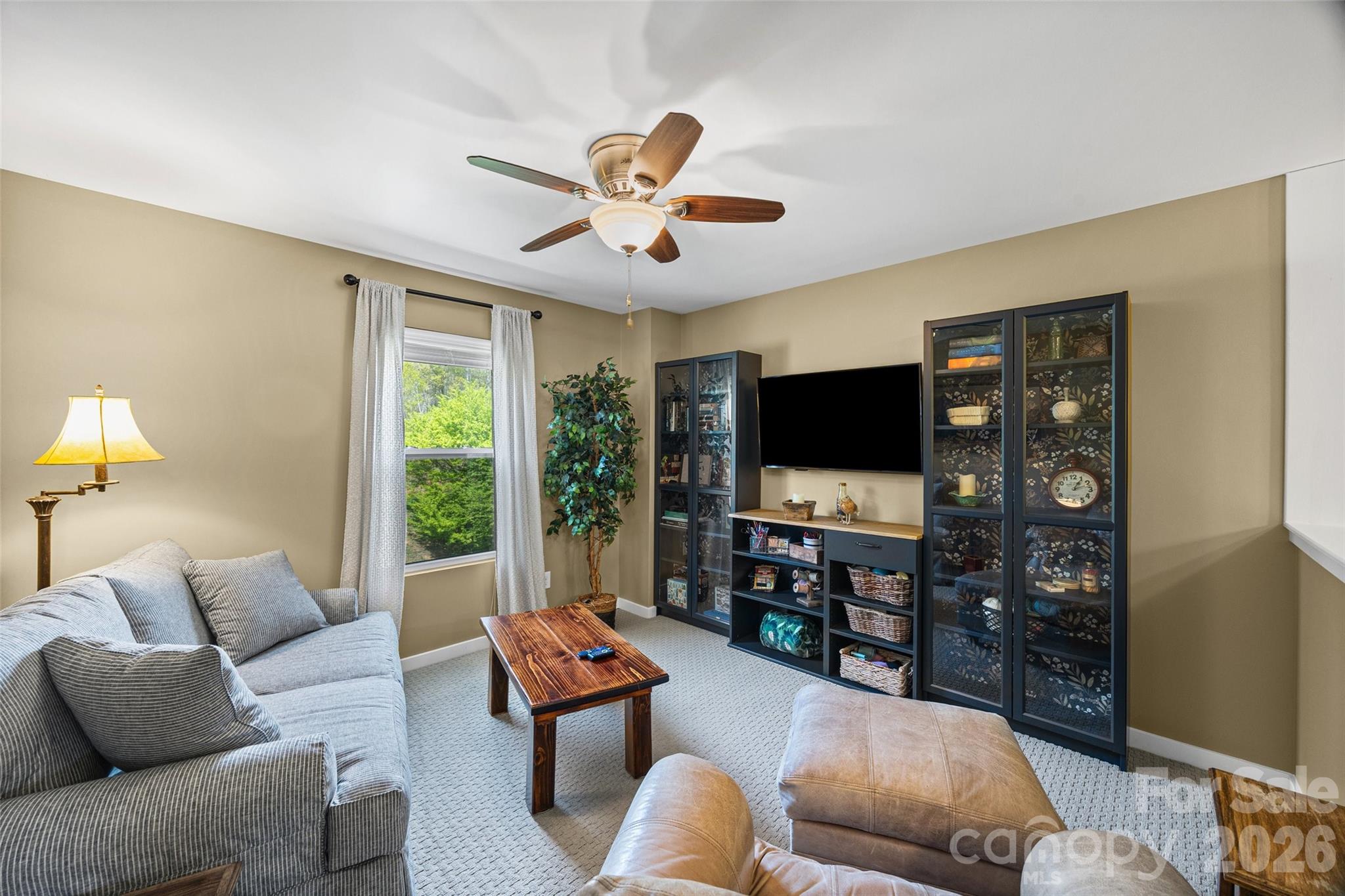 334 Battery Circle Clover, SC 29710 - Photo 14 of 29 a living room with furniture and a flat screen tv