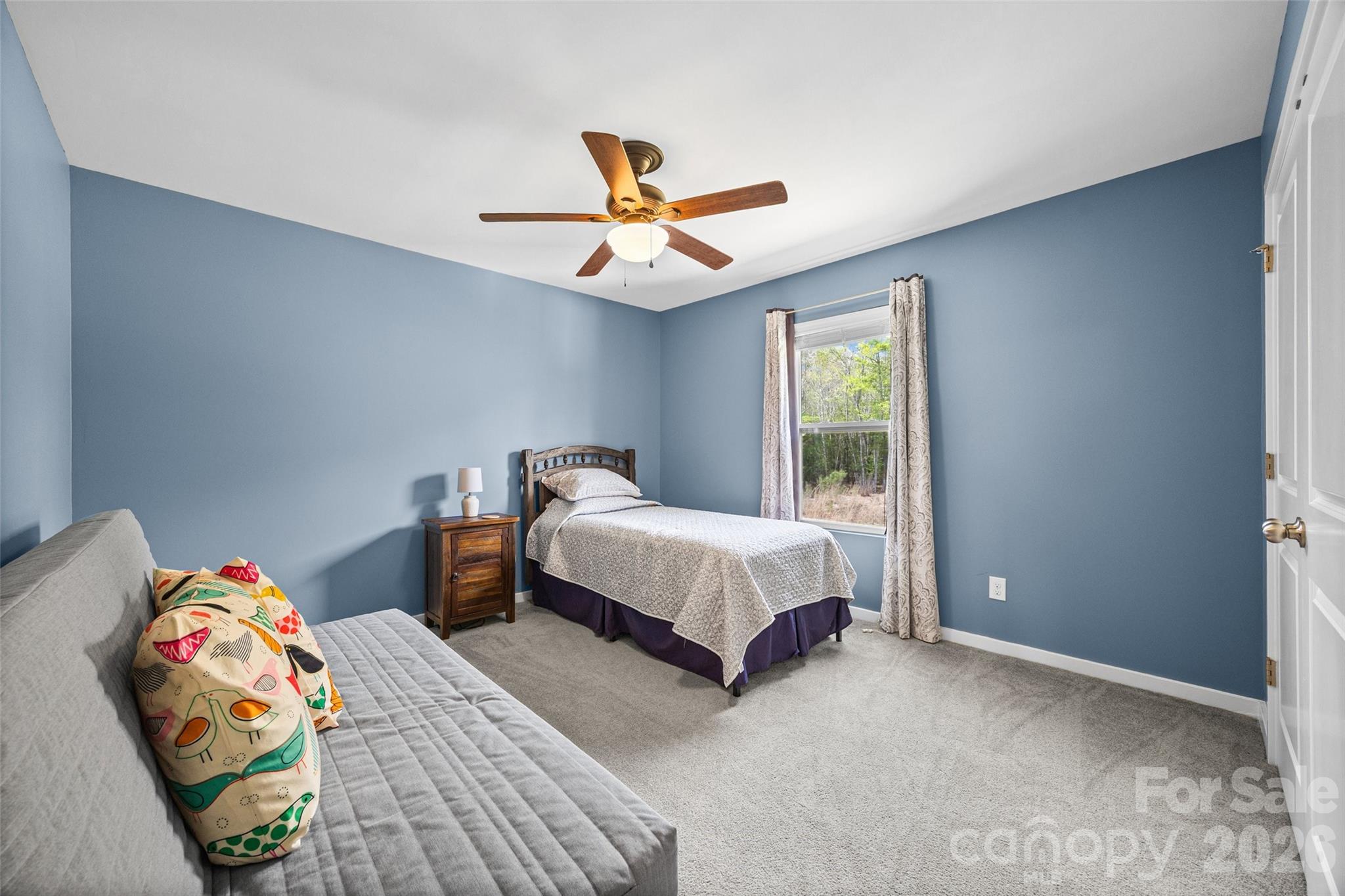 334 Battery Circle Clover, SC 29710 - Photo 15 of 29 a bedroom with a bed and a window