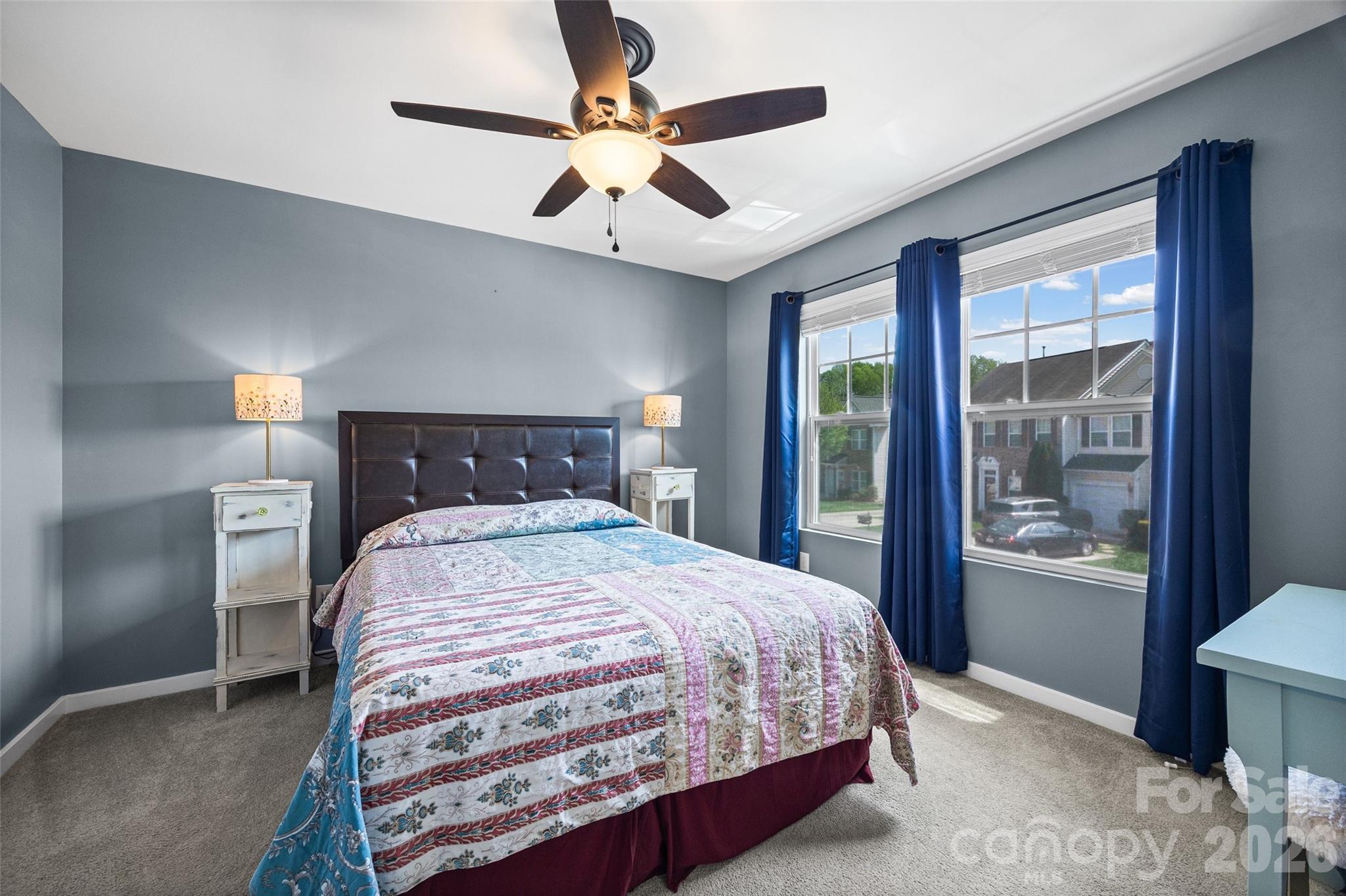 334 Battery Circle Clover, SC 29710 - Photo 16 of 29 a bedroom with a large bed and a large window