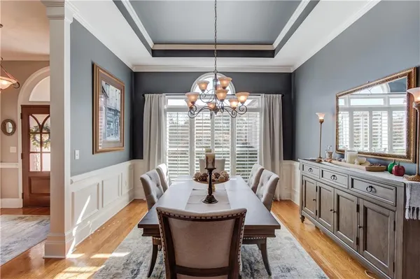 a living room with furniture fireplace and flat screen tv