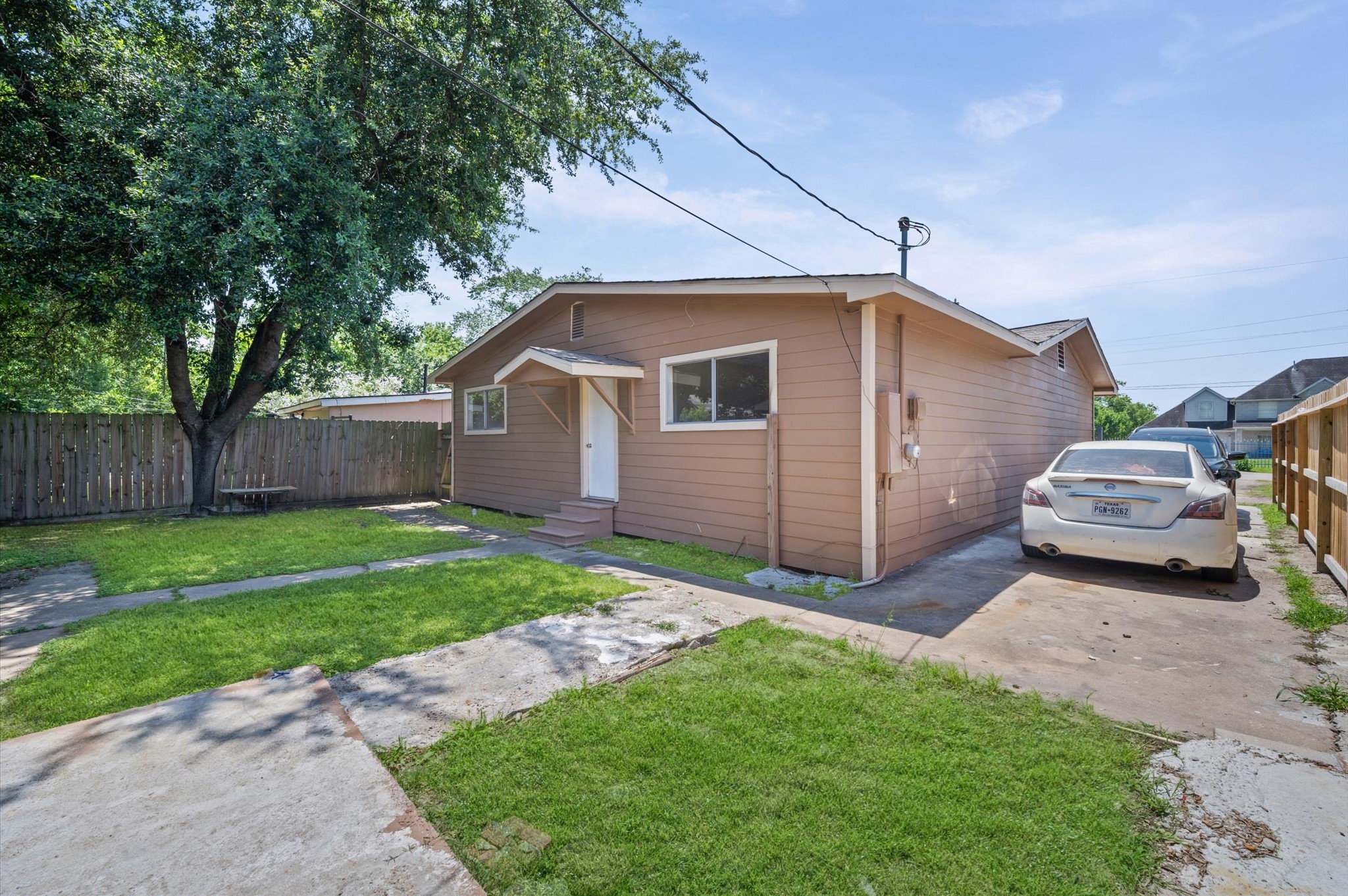 10621 Lane Street Houston, TX 77029 - Photo 2 of 29 a view of a house with a back yard