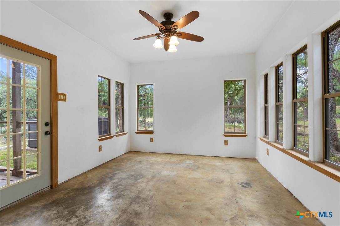 700 Camino De Rancho Wimberley, TX 78676 - Photo 16 of 41 a view of an empty room with a window