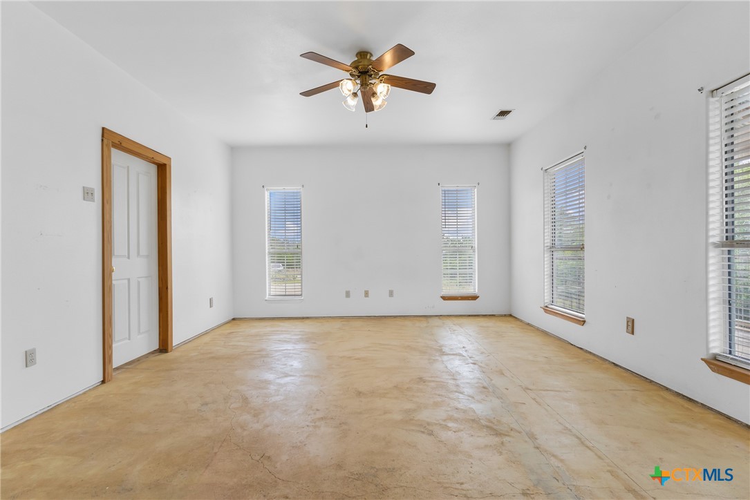 700 Camino De Rancho Wimberley, TX 78676 - Photo 19 of 41 a view of an empty room with a window