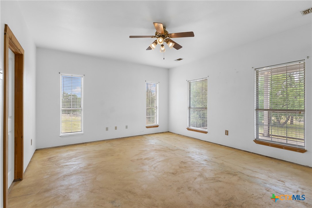 700 Camino De Rancho Wimberley, TX 78676 - Photo 20 of 41 a view of an empty room with a window