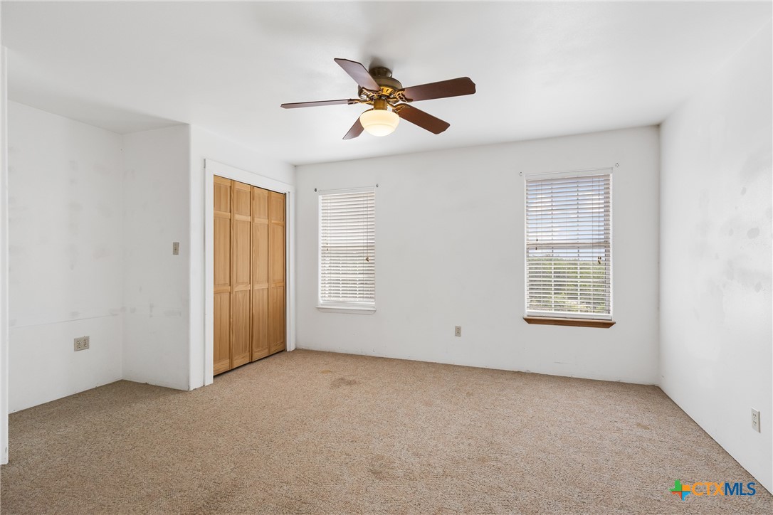 700 Camino De Rancho Wimberley, TX 78676 - Photo 28 of 41 a view of an empty room with a window