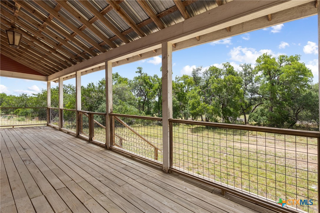 700 Camino De Rancho Wimberley, TX 78676 - Photo 32 of 41 a view of balcony with wooden floor