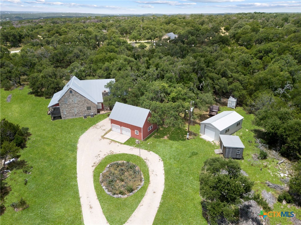 700 Camino De Rancho Wimberley, TX 78676 - Photo 39 of 41 an aerial view of a house with garden space and street view