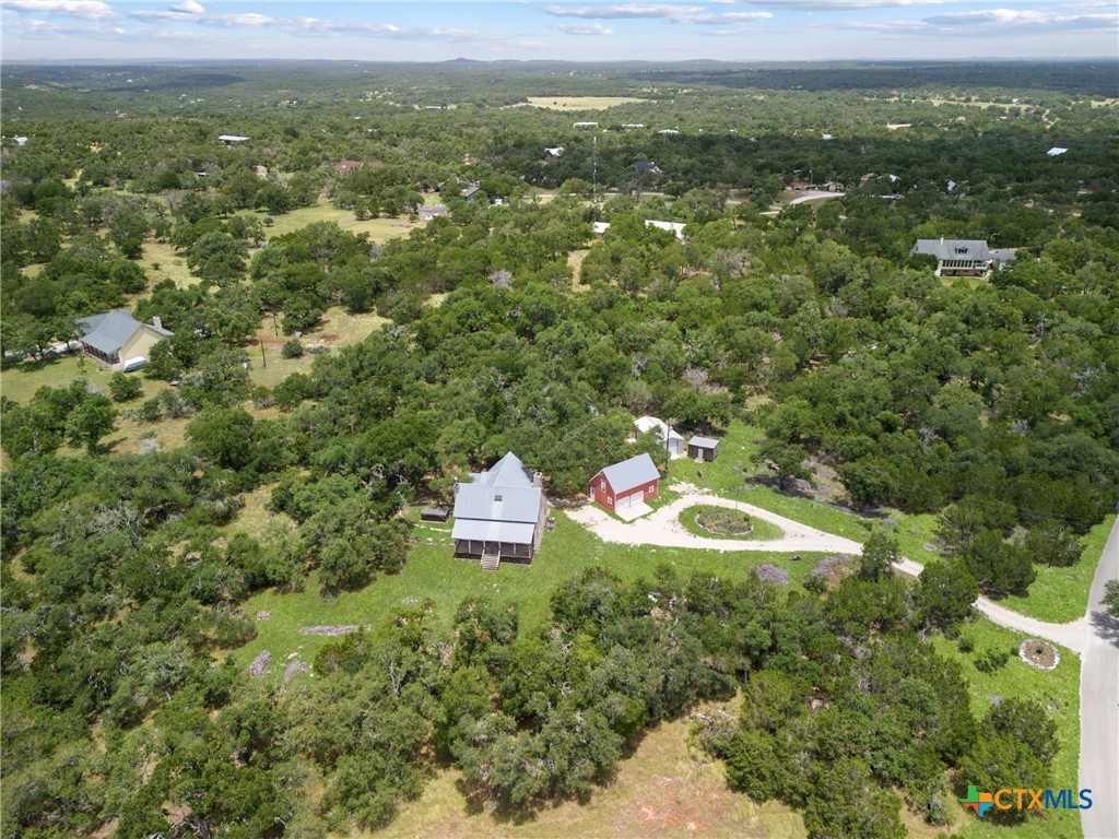 700 Camino De Rancho Wimberley, TX 78676 - Photo 41 of 41 a view of a city with lush green forest